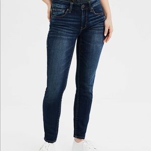 Dark wash skinny jeans.